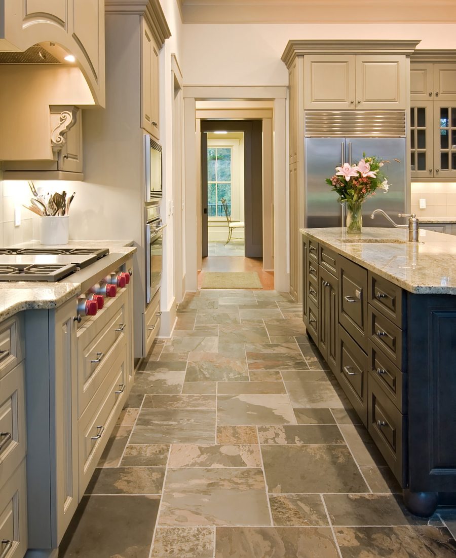 expensive kitchen with slate floors and mixed wood